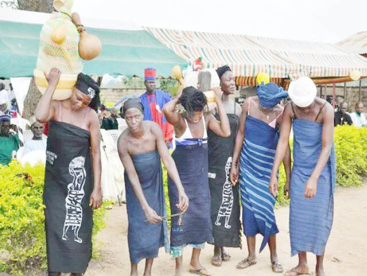 Gbagi unique culture of carrying loads on shoulder