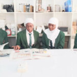 Students of Key Special Academy reading Teen Trust