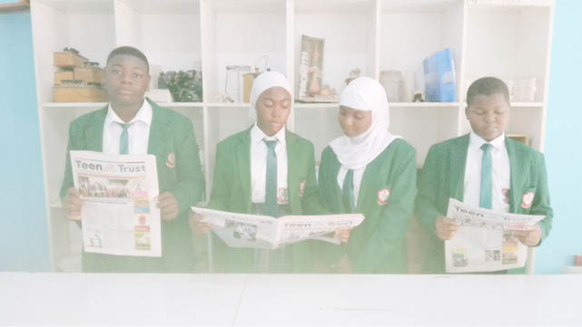 Students of Key Special Academy reading Teen Trust