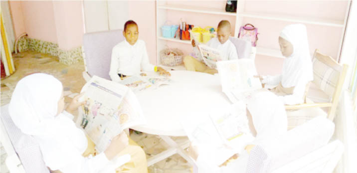 Students of Ladybird School, Kano reading Teen Trust