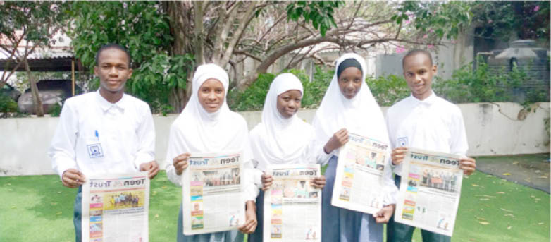 Students of Ladybird School, Kano reading Teen Trust