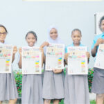 Students of Lagooz Schools, Lagos with copies of Teen Trust