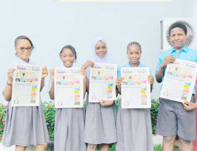 Students of Lagooz Schools, Lagos with copies of Teen Trust