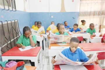 Students of Lordswill Academy, Abuja digesting the content of the Teen Trust Newspaper