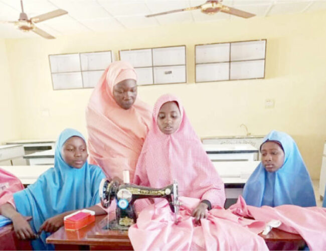 Students of Government Girls Arabic Senior Secondary School, Dutsinma Katsina State acquiring tailoring skills