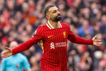 Liverpool hold on to beat Wolves and restore seven-point lead