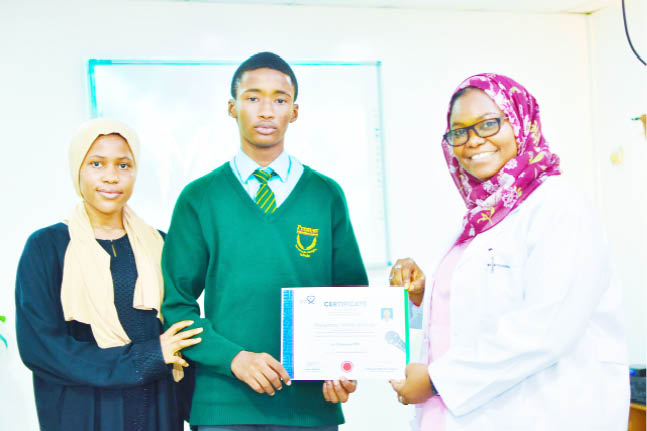 Mohammed Aminu Abubakar of Premier International Abuja shines at the 2024 KCHI First National Essay competition