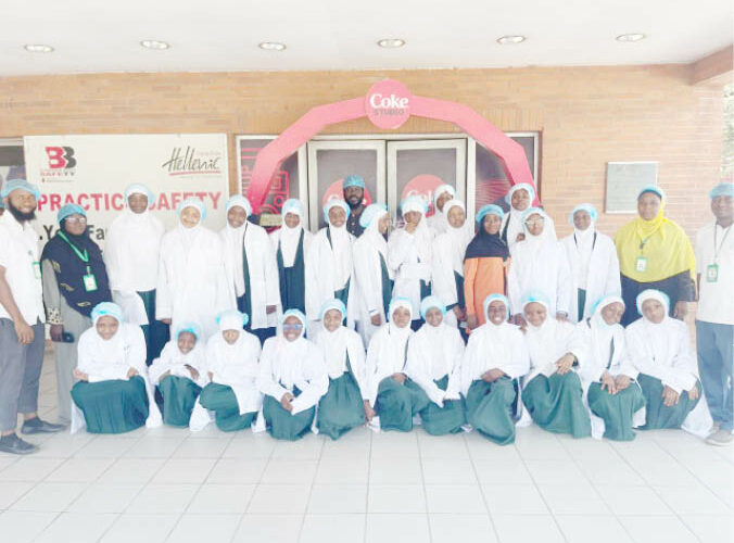 Students of I Scholars International Academy during their excursion to Coca cola Bottling company