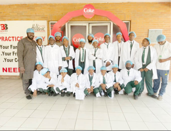 Students of I Scholars International Academy during their excursion to Coca cola Bottling company