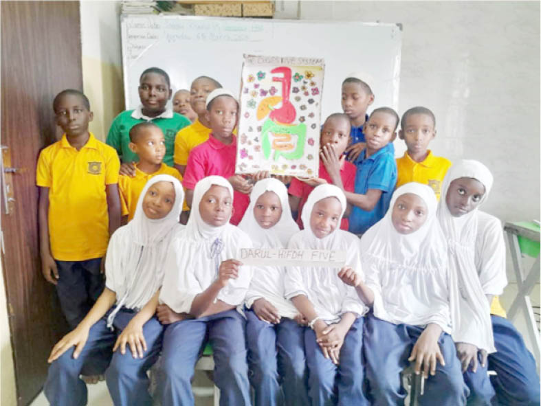 pupils of I Scholars International Academy presenting their projects