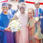 Meet the lucky Kaduna flower girl who welcomed both President and First Lady