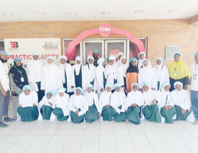 Students of I Scholars International Academy during their excursion to Coca cola Bottling company