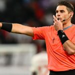 VAR official who made hand gesture returns to duty