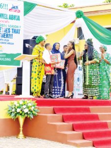 Hanan Jidda receiving an award at NTA Independence Day Celebration